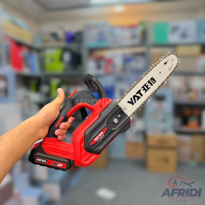 Red and black cordless mini chainsaw with a white guide bar.
